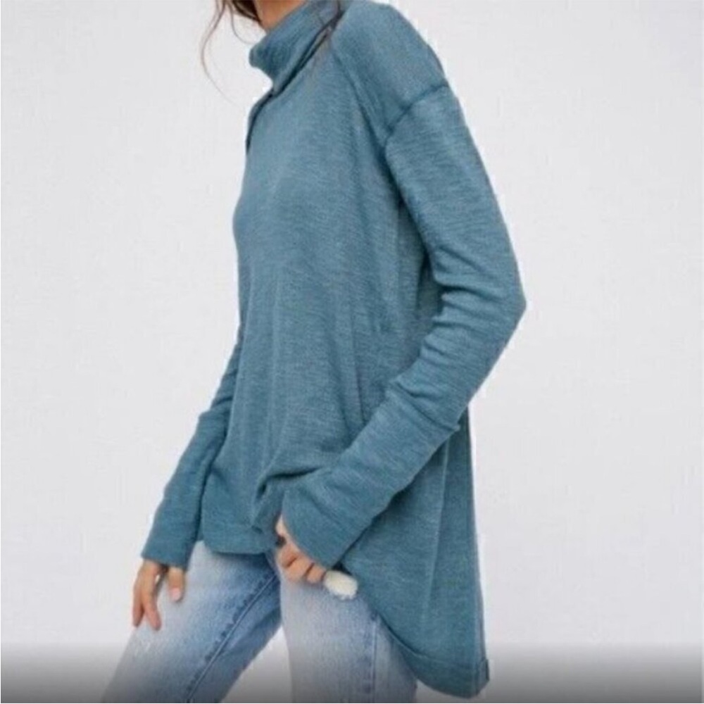 Free People We The Free Kori Split Back Turtleneck in teal.